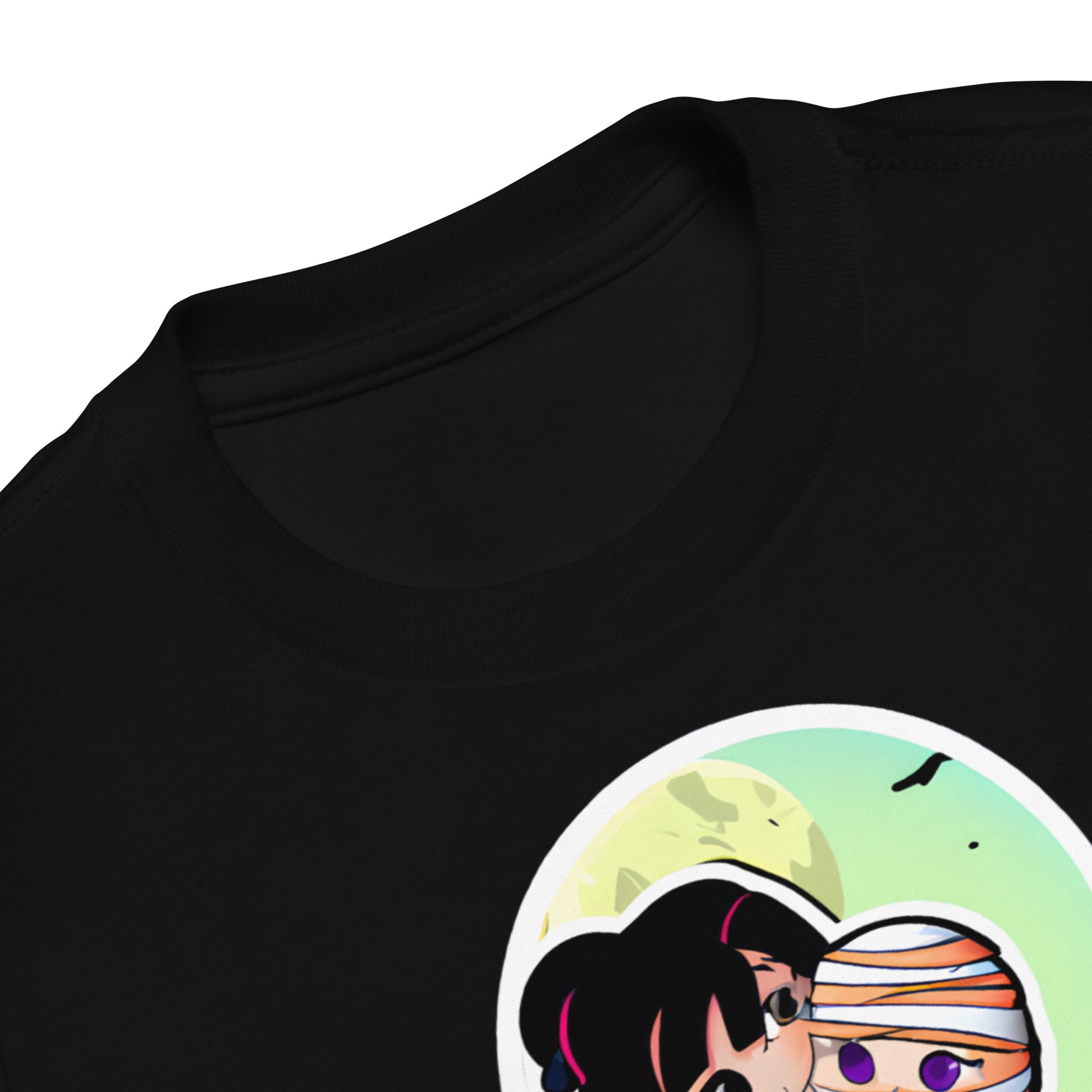 closeup of black t-shirt, showing the moon and the top of mother and son's head