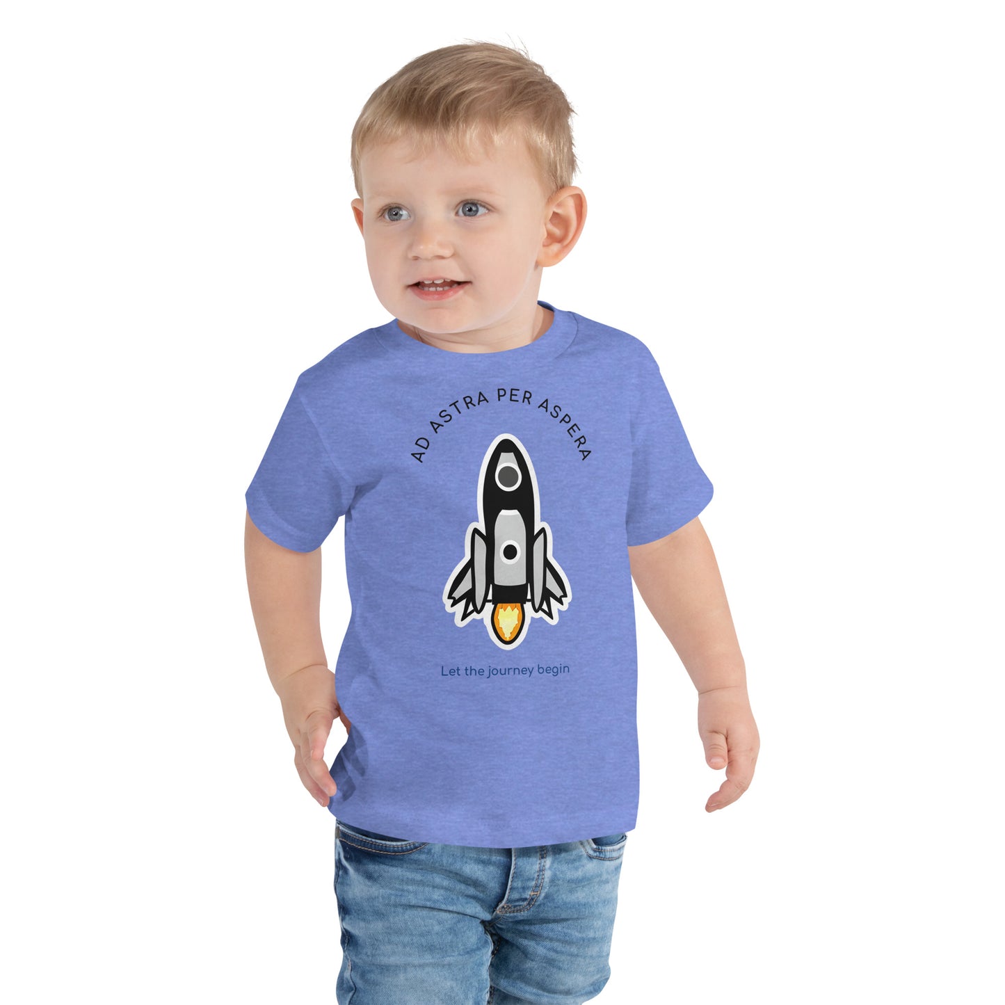 young boy wearing blue rocketship shirt