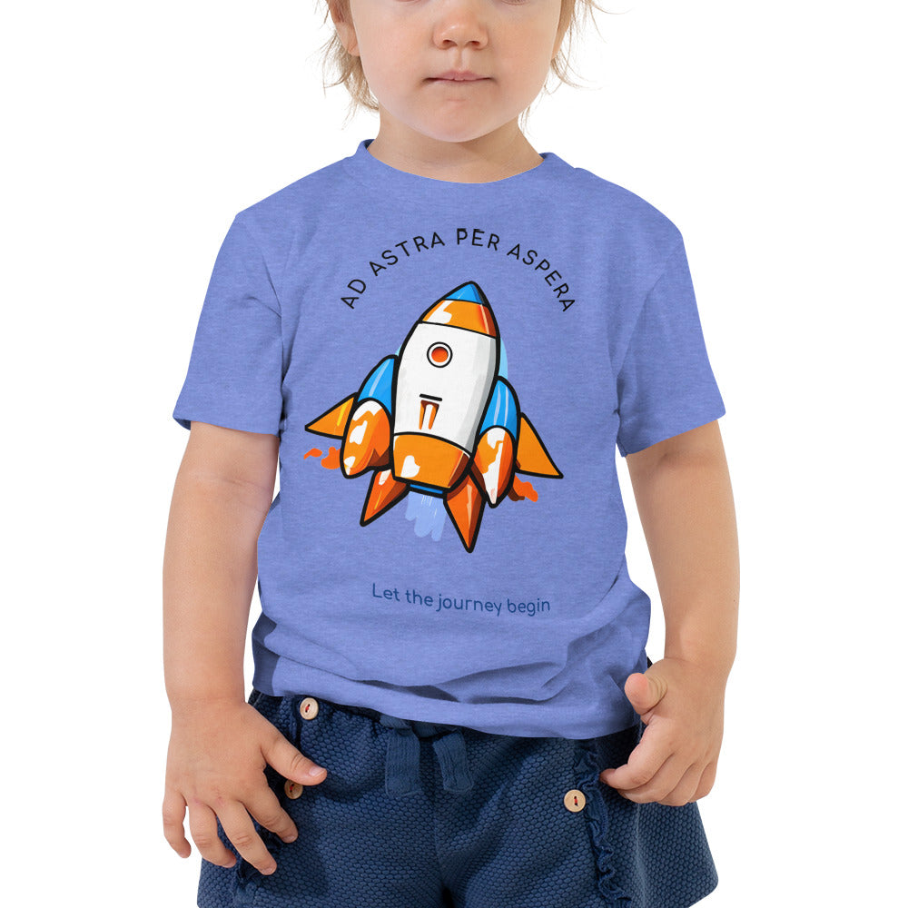 girl wearing blue rocketship shirt