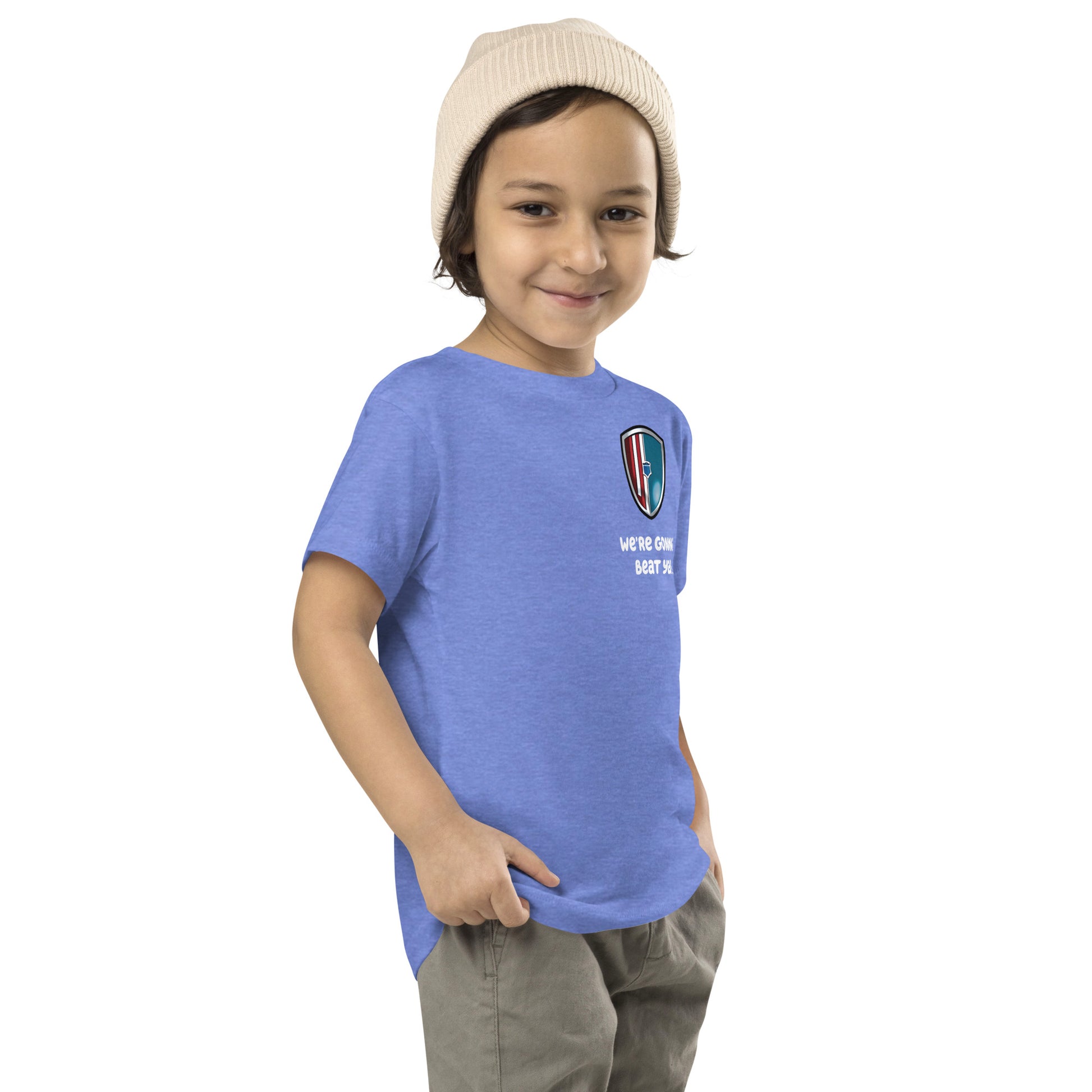 boy smirking while wearing Bluey Team Dad Blue shirt
