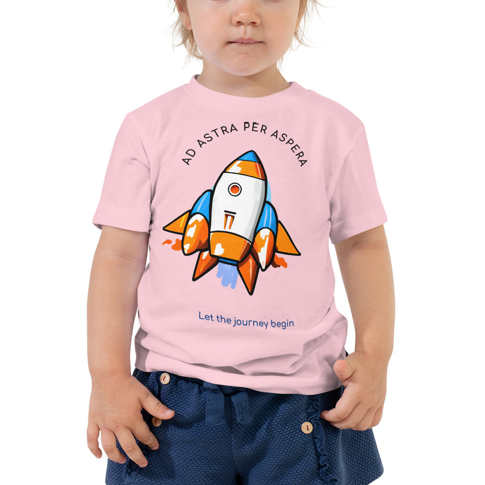 girl wearing pink rocketship shirt