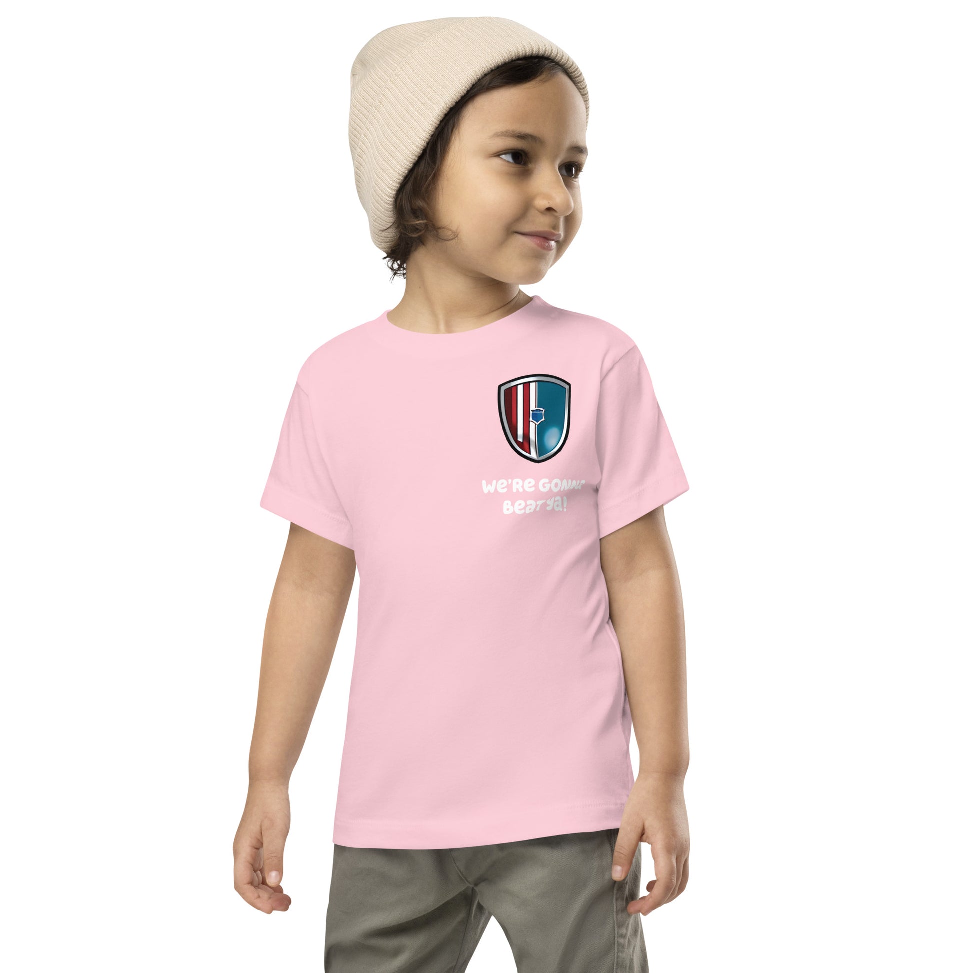 boy looking sideways while wearing Bluey Team Dad Pink shirt