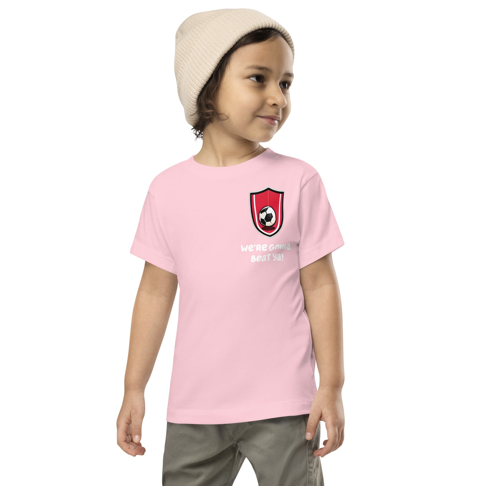 boy looking sideways while wearing Bluey Team Mom pink shirt