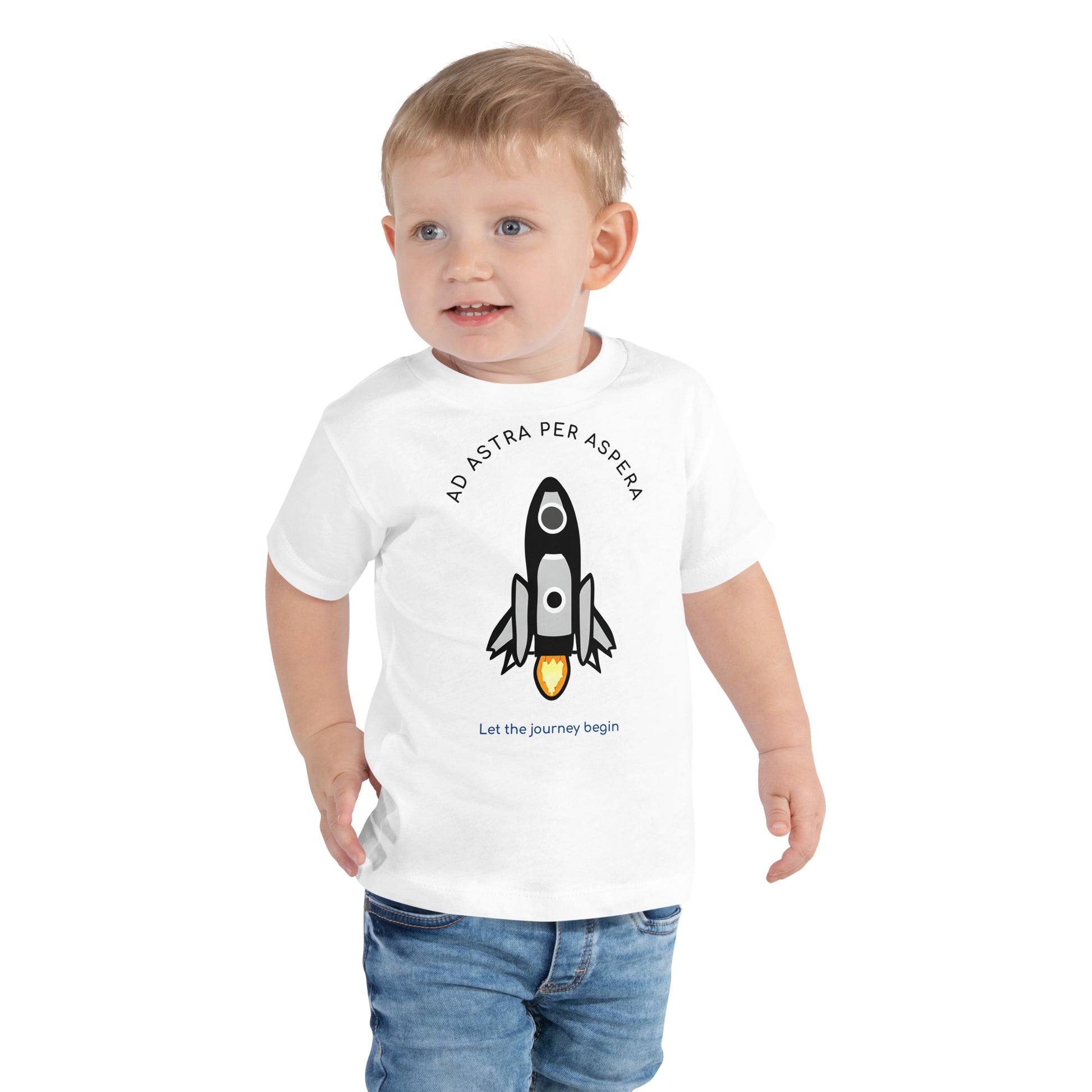 boy wearing white rocketship t-shirt