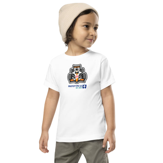 kid wearing formula 1 t-shirt looking to his left