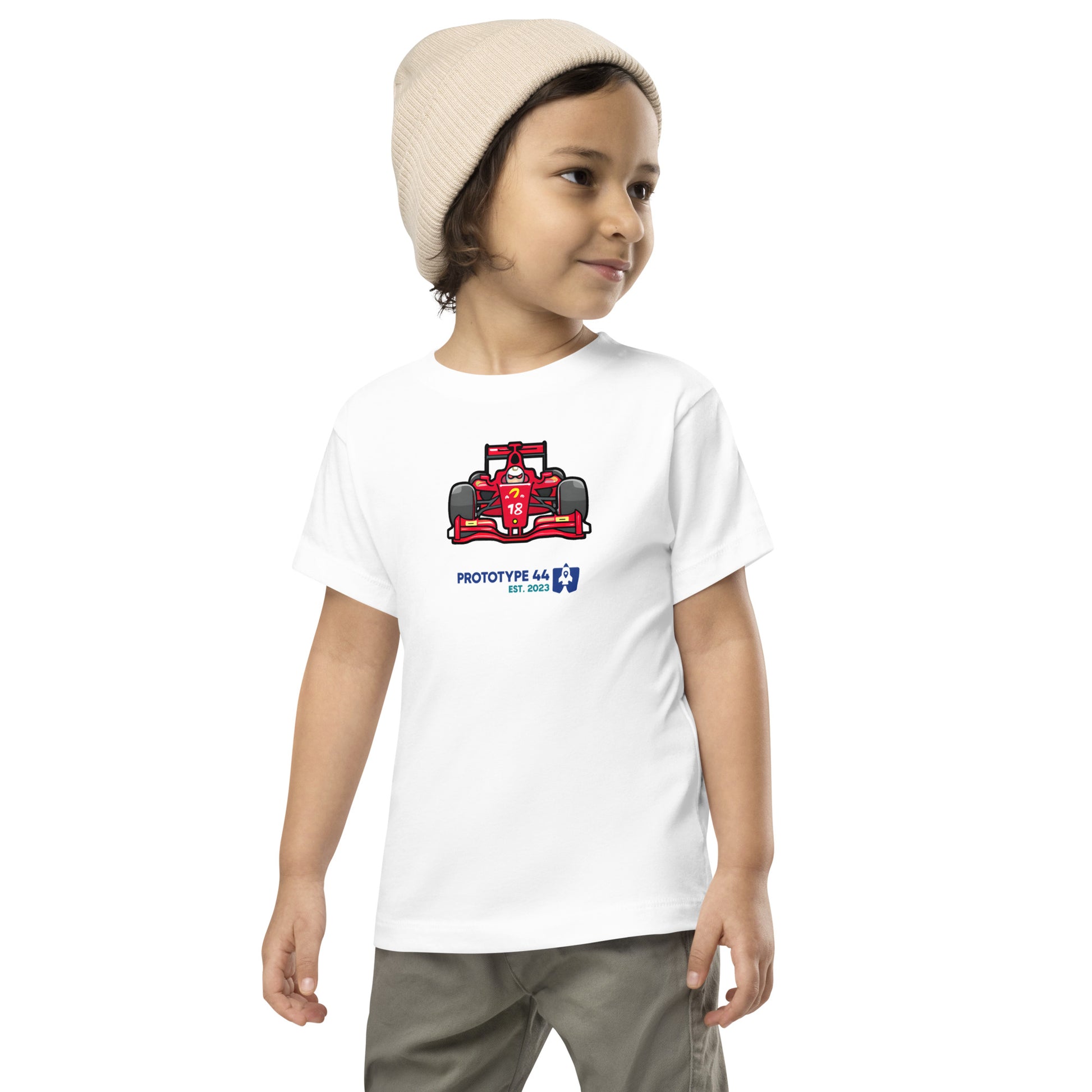 boy looking sideways wearing red F1 race car design shirt