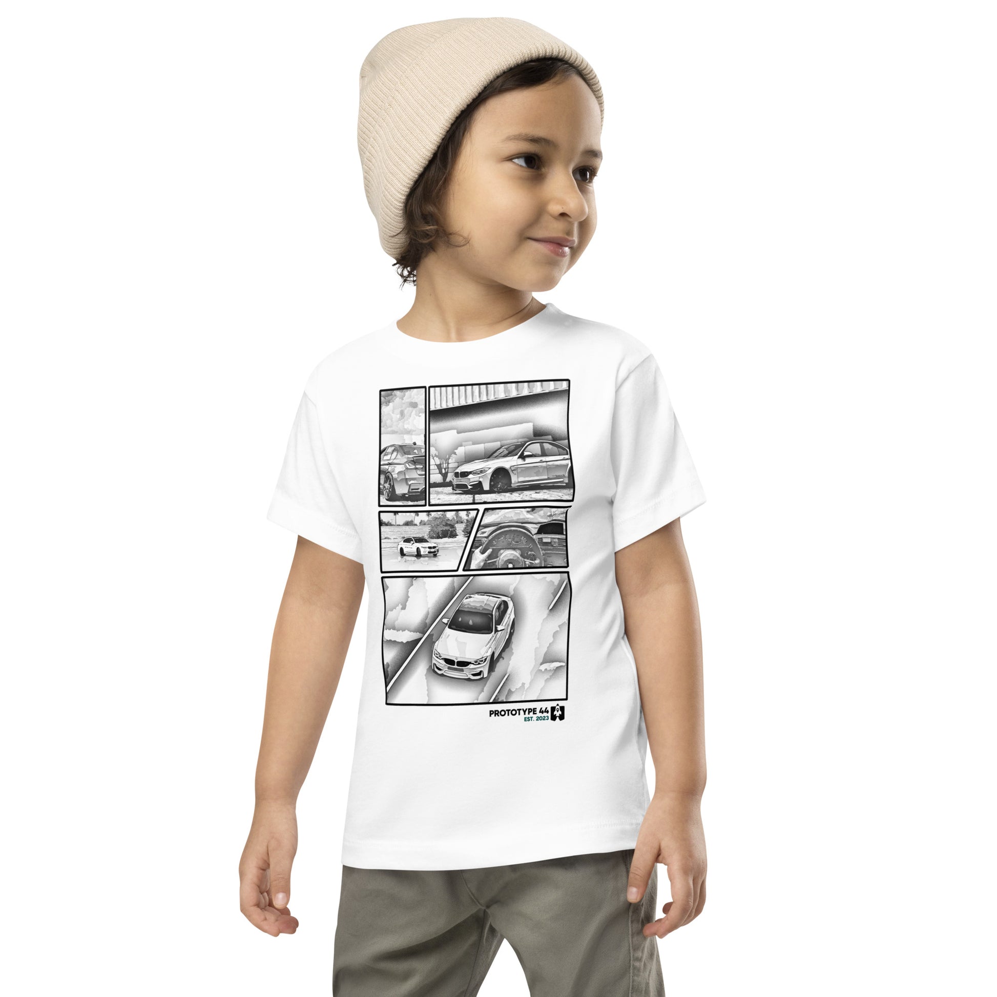 boy looking sideways while wearing BMW F80 M3 white toddler shirt