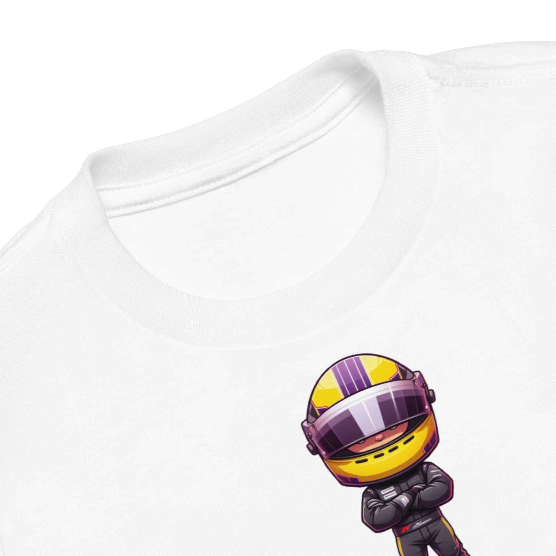 Closeup of kids t-shirt showing a cartoon racing driver with yellow helmet and black racing uniform