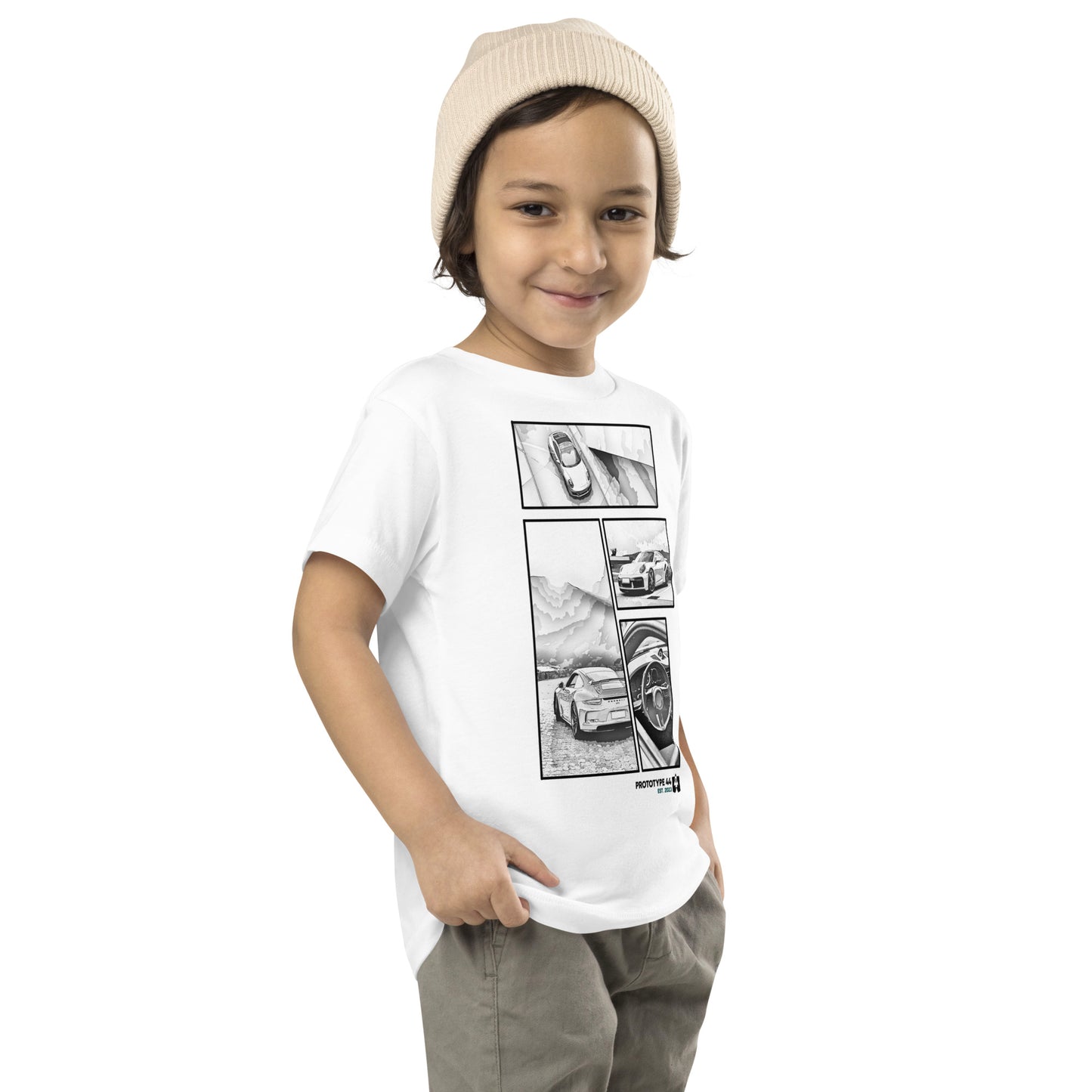 boy smirking while wearing white Porsche t-shirt